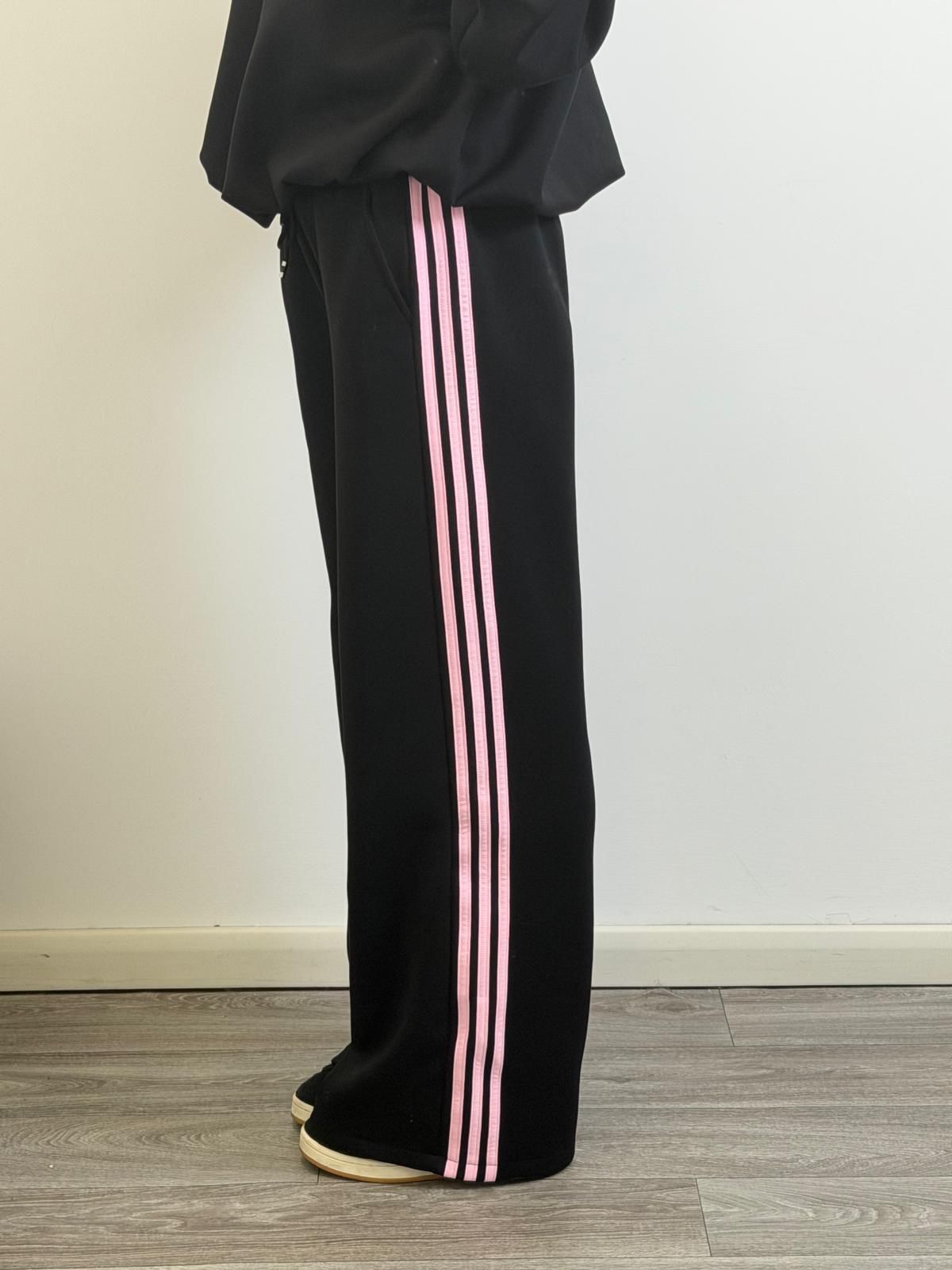 Panta Urban nero riga rosa