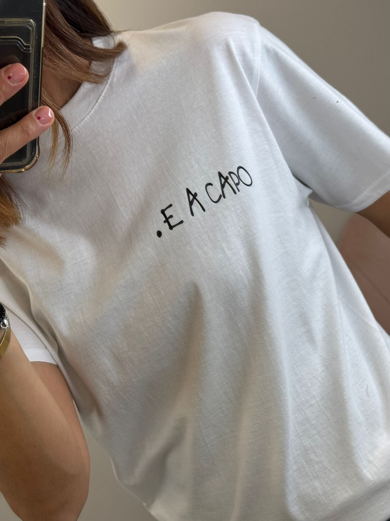 T-shirt . e a capo